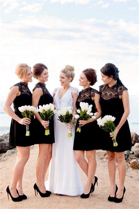 Black And White Wedding Bridesmaids In Black With White Bouquets