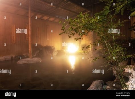 Open Air Hot Springs Onsen Bath House Taken At Night Located Inside A Ryokan In Shibu Onsen