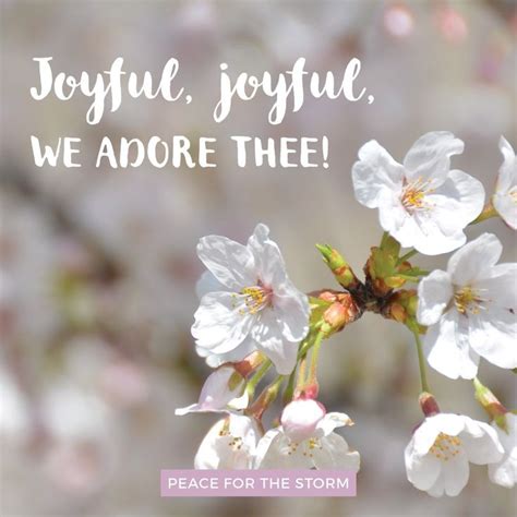 The Words Joyful Joyful We Adore Thee Are In White Flowers