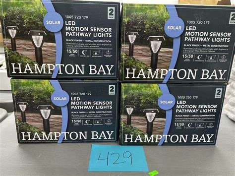 (4) BOXES OF HAMPTON BAY PATHWAY LIGHTS - Earl's Auction Company