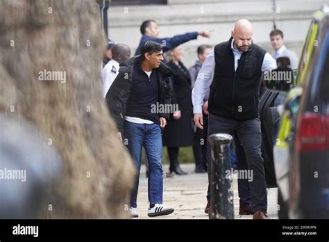 Prime Minister Rishi Sunak leaves from the rear entrance of Downing ...