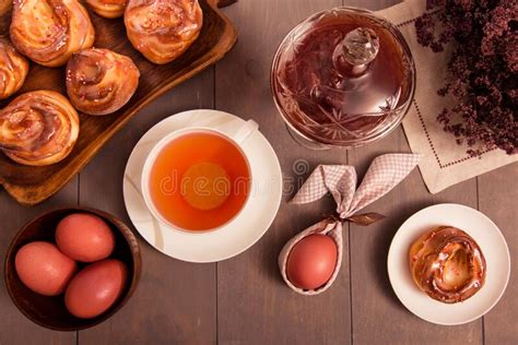 Easter Breakfast Still Life With Colored Eggs Tea With Lemon In A