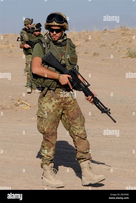 Italian Soldiers Conduct A Foot Patrol During Training At Camp Arena