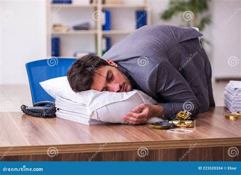 Young Male Employee In Oversleeping Concept Stock Photo Image Of