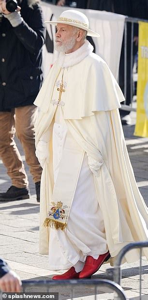 John Malkovich Wears Full Papal Regalia As He Shoots Scenes For The New