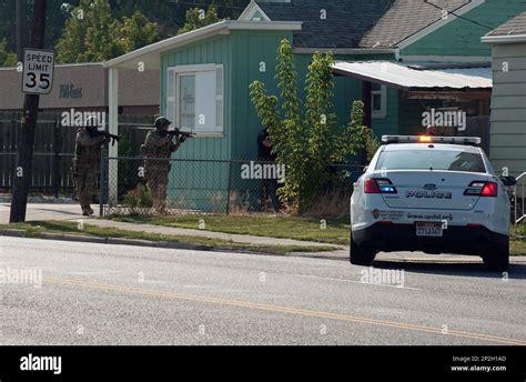 Unified Police Swat Officers Get A View Of The House Off Camera To The