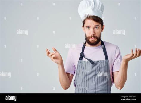 Man In Chef S Uniform Cooking Food Restaurant Stock Photo Alamy