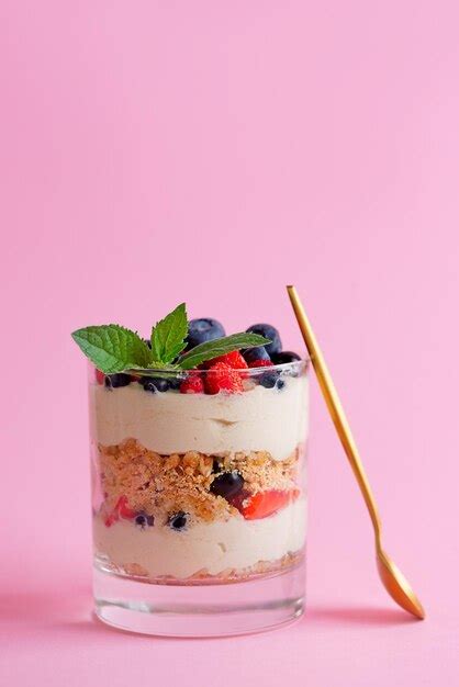 Premium Photo Trifle Dessert In A Glass With Berries Mint Whipped