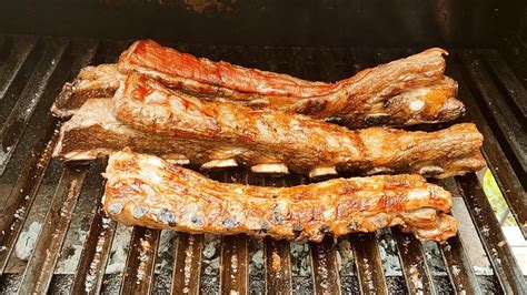 TIRA DE ASADO A LA PARRILLA DE RES Y CERDO EL CORTE MAS PARRILLERO