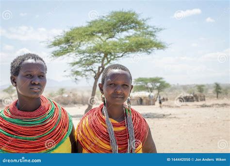 Portrait Of Two Young Maasai Girls With Traditional Jewelery And