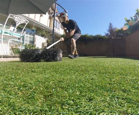 artificial grass maintenance   maintain fake grass bella turf