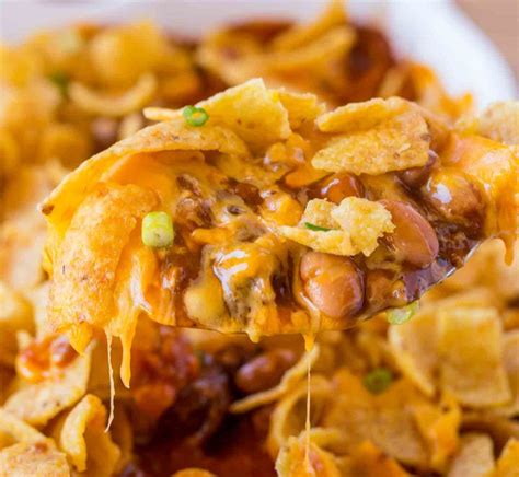 Cheesy Crunchy Frito Pie With Ground Beef Ranch Style Beans Cheese And Enchilada Sauce Baked