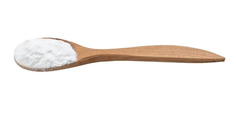 Premium Photo | Sodium bicarbonate in wooden spoon isolated