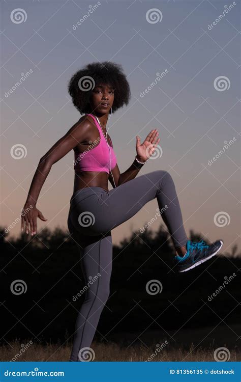 Black Woman Is Doing Stretching Exercise Relaxing And Warm Up Stock