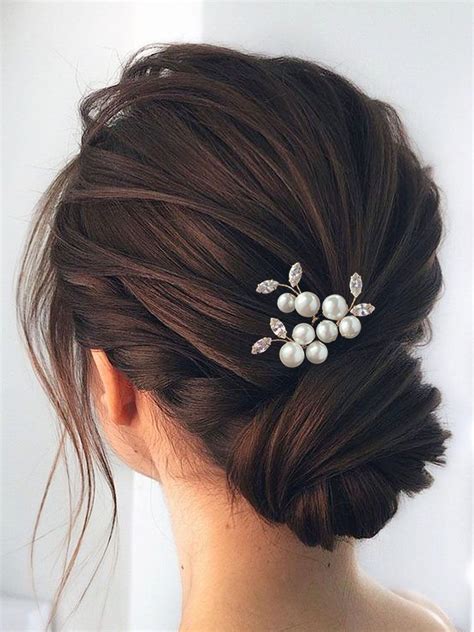 Stylists debate the most durable bridesmaid updo hairstyles 30
