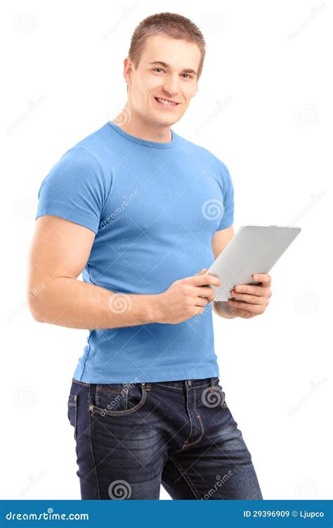 Young Man Holding A Tablet And Looking At Camera Stock Image Image Of