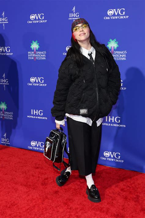 Billie Eilish Goes Preppy In Black Leather Loafers At The Palm Springs