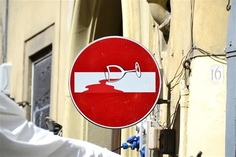 Clet The Street Artist Behind The Customized Traffic Signs In