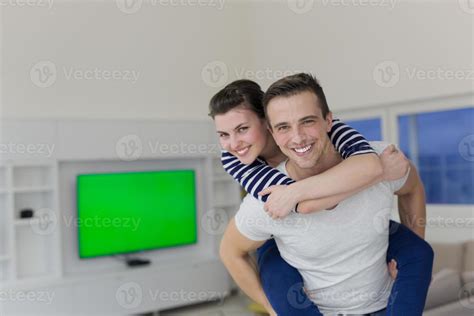 Handsome Man Piggybacking His Girlfriend Stock Photo At Vecteezy