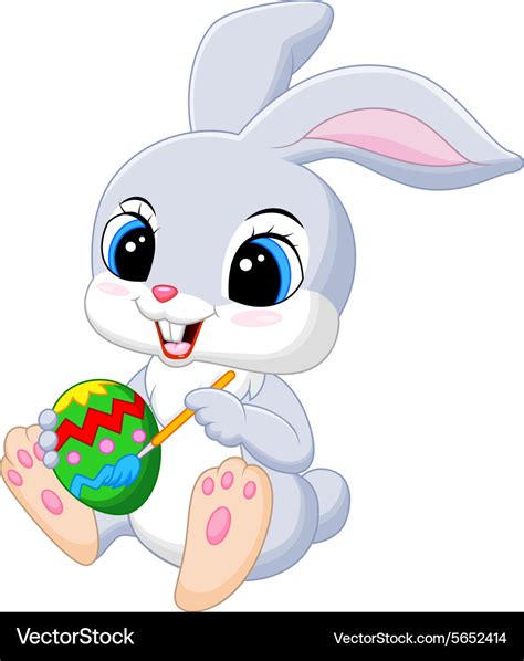 Cute easter bunny painting an egg Royalty Free Vector Image