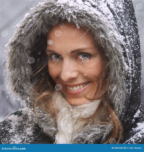 Loving The First Snowfall An Attractive Woman Enjoying Herself Outside