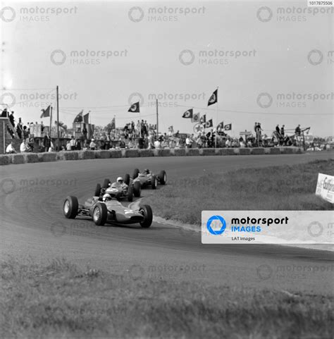 John Surtees Ferrari 158 Leads Bob Anderson Brabham BT11 Climax And