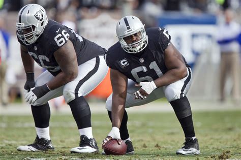 Oakland Raiders offensive line, teammates sit during national anthem