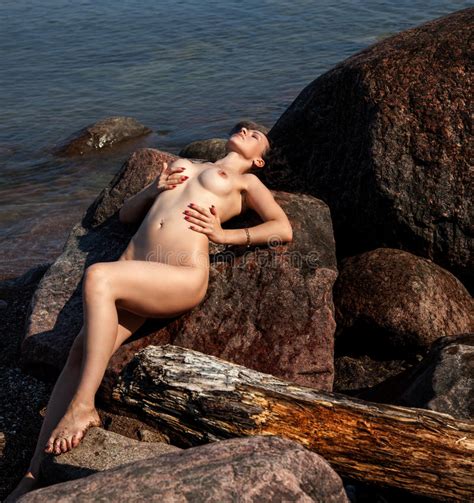 Nude Woman Lying On Stones Stock Image Image Of Female