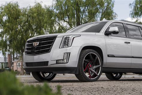 Lifted And Proud Gray Cadillac Escalade On Forgiato Rims