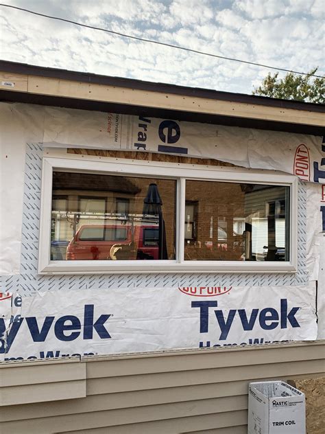 Door, Gutters, Siding, and Window Replacement Project in Milwaukee, WI