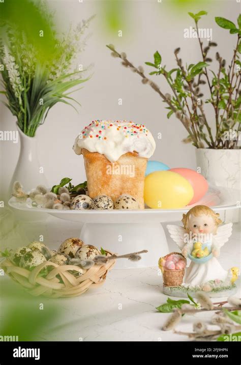 Easter Cake And Colorful Eggs On A Festive Easter Table With Pussy