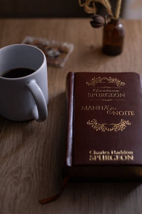 Brown Book Beside White Ceramic Mug On Brown Wooden Table · Free Stock