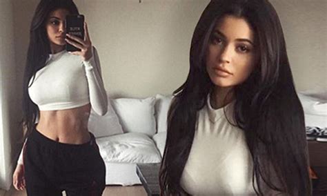 Kylie Jenner Shows Off Sculpted Midsection In Crop Top And Adidas Track