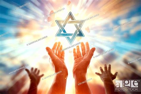 Close Up Hands On The Background Of The Symbol Of Judaism Prayer The