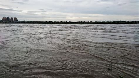 A River With Overwhelming Water After Heavy Rain Nearly Caused Flooring