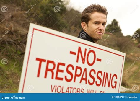 A Man Passing No Trespassing Sign Stock Image Image Of Horizontal Robber 12892707