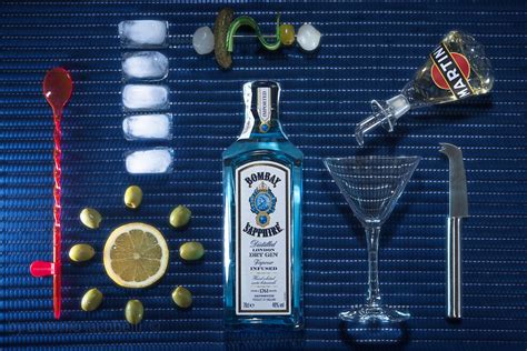435990 Olives Ice Cubes Bottles Drinking Glass Lemons Blue Blue