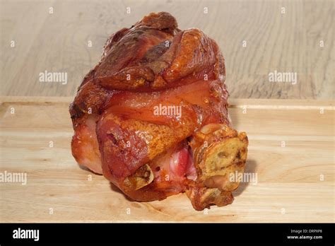 Roasted Pork Gammon Shank On A Cutting Board Stock Photo Alamy