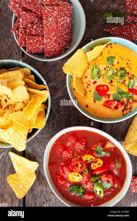 Delicious cheese dip with chips Stock Photo - Alamy