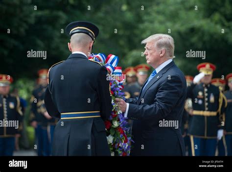 President Donald Trump Lays A Wreath At The Tomb Of The Unknown Soldier