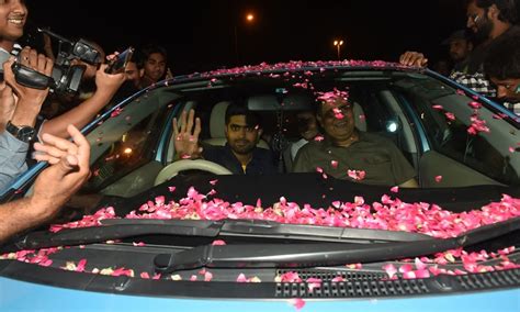 Babar Azam leaves the airport with his car draped in rose petals ...