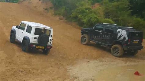 Stock Suzuki Jimny Challenges Modded Hummer H2 In