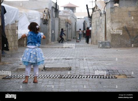 A Portrait Of A Sweet Refugee Child In The Camp Syrian Refugees Stock