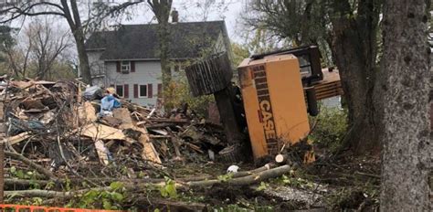 Excavator Tips Over During Home Demolition - OnFocus