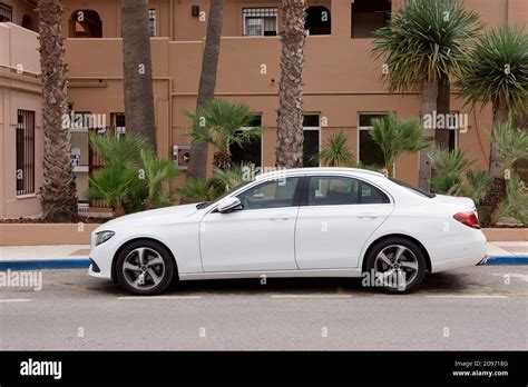 White Car Parked By Palm Trees Stock Photo Alamy