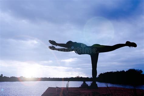 Yoga in Silhouette with Dramatic Sunset Sky Background Stock Image ...