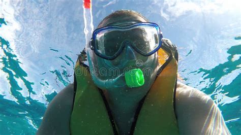 Close Up Of A Man Underwater A Man In A Mask And With A Snorkel Stock