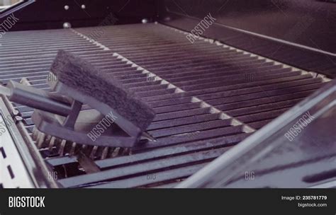 Cleaning Gas Grill Image & Photo (Free Trial) | Bigstock