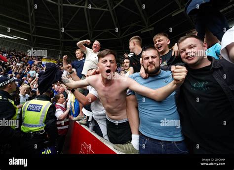 Leeds United Fans Celebrate Survival After The Premier League Match At The Brentford Community