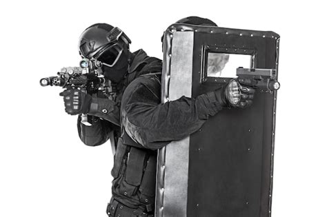 Premium Photo Swat Officer With Ballistic Shield